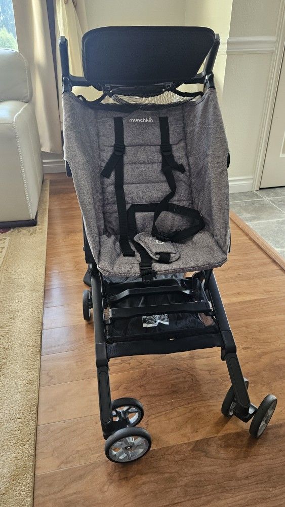 Munchkin Travel Pocket Stroller.