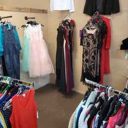 New work dresses and play dresses $10 evening gowns $20 all new