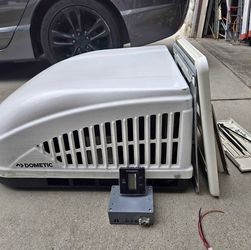 Used dometic 15k btu air conditioner. Nothing wrong with it. Includes thermostat. Comes with everything in pic. This is a ducted unit, but has dump fe