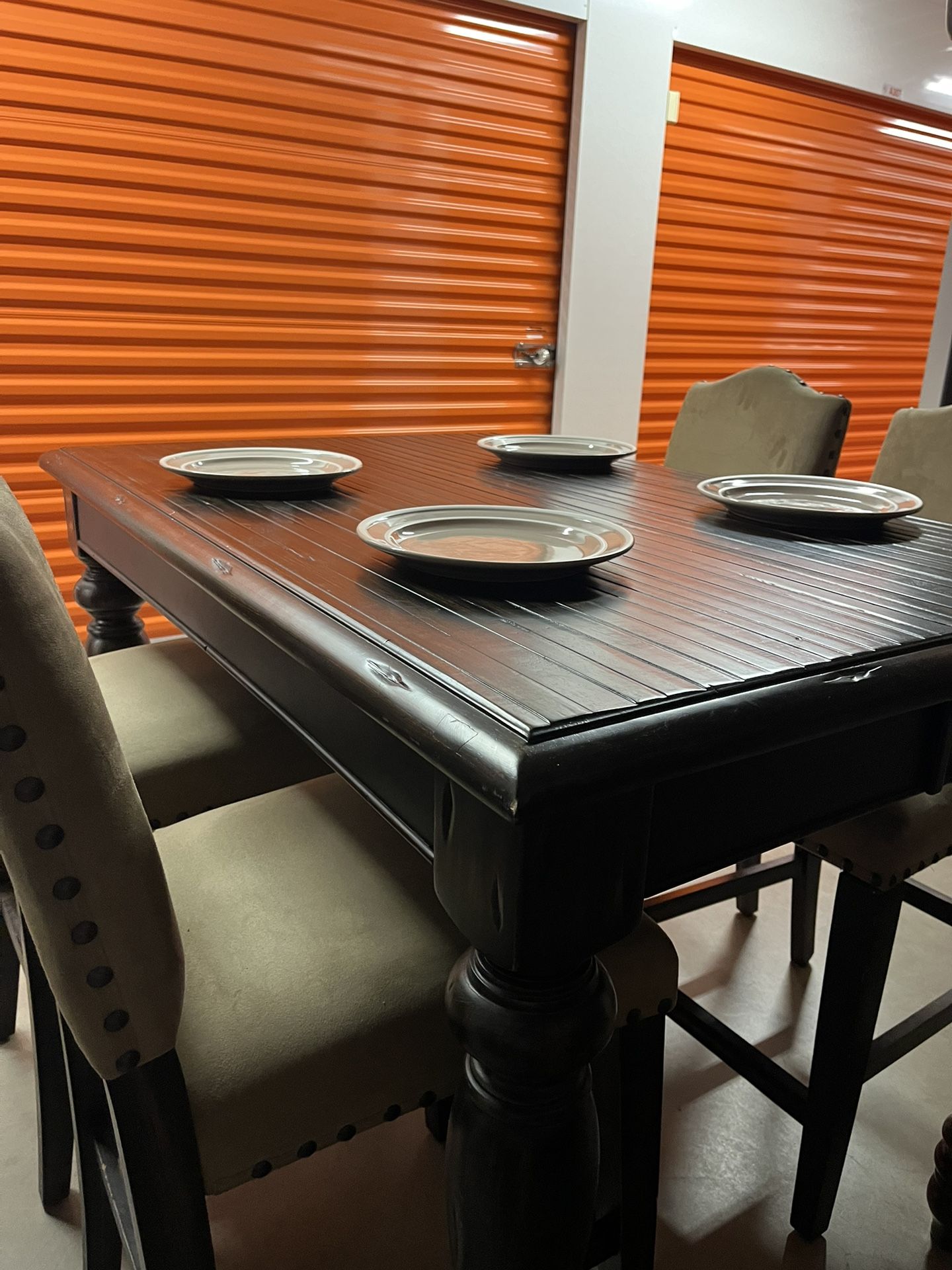 Bar height dining table With 6 Upholstered Chairs.  