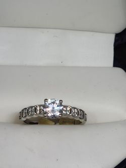 Dainty traditional engagement rings