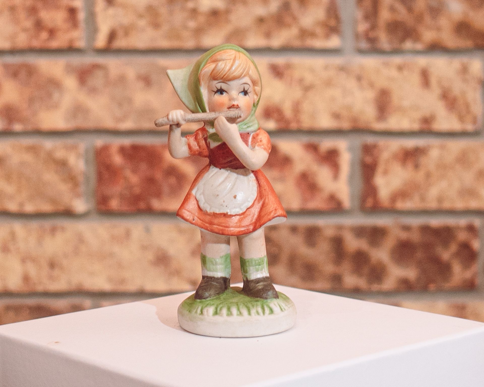 Vintage Girl Playing Flute Porcelain Figurine, Great condition.