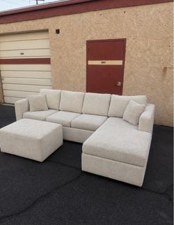 WITH DELIVERY Beige Sectional couch with Ottoman