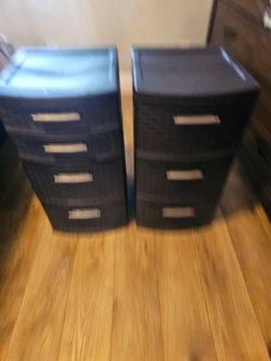2 brown plastic drawers