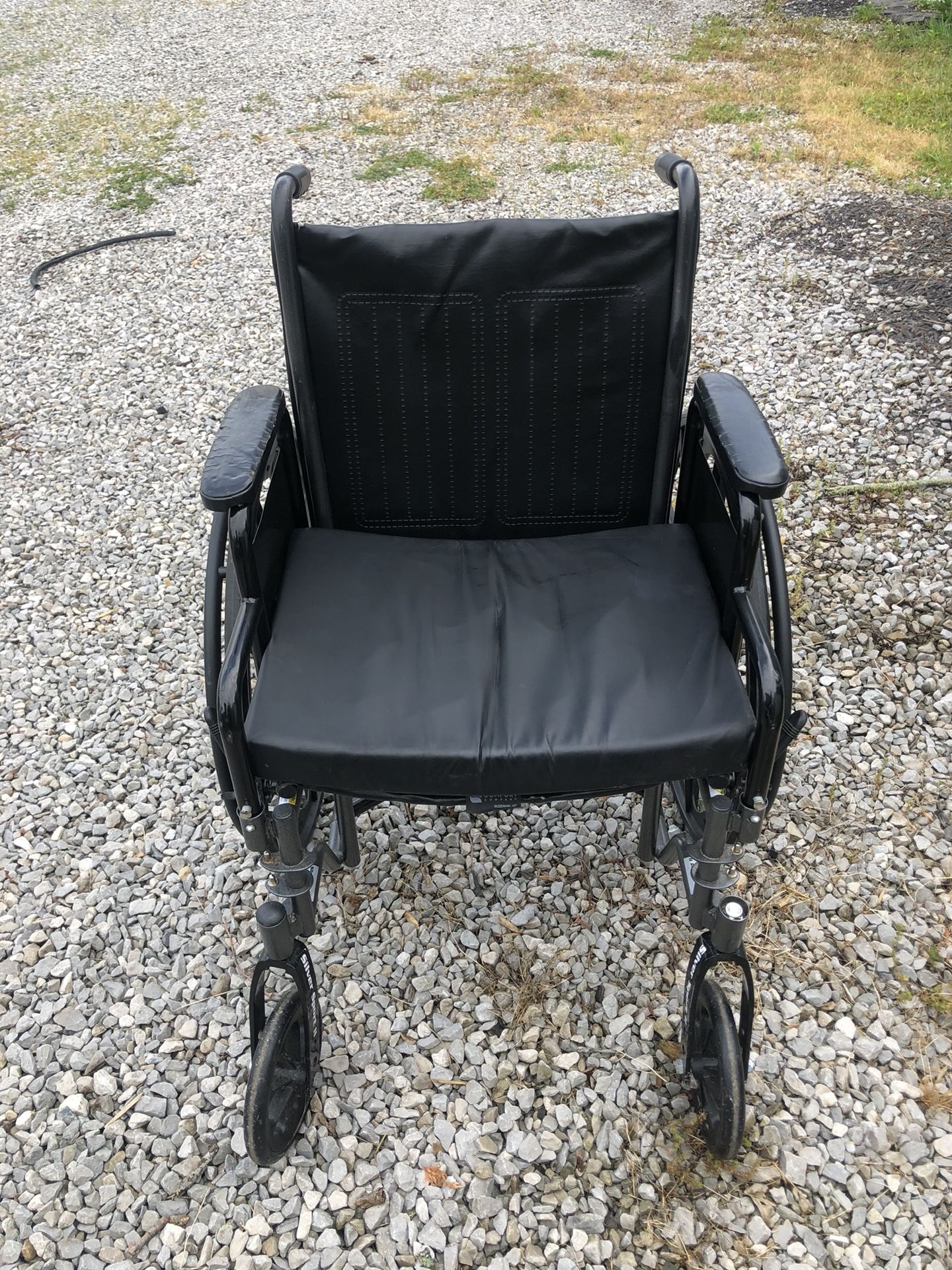 Wheelchair that collapses for easy travel. With Comfort Element cushion.