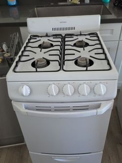 Small stove 20 inches wide gas  everything works delivery available extra charge