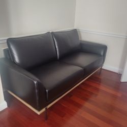 Black  leather couch and  loveseat 