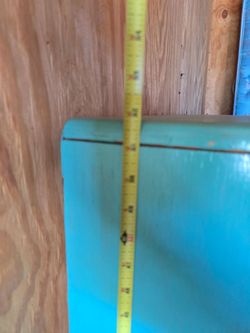 Teal Fiberglass Surfboard