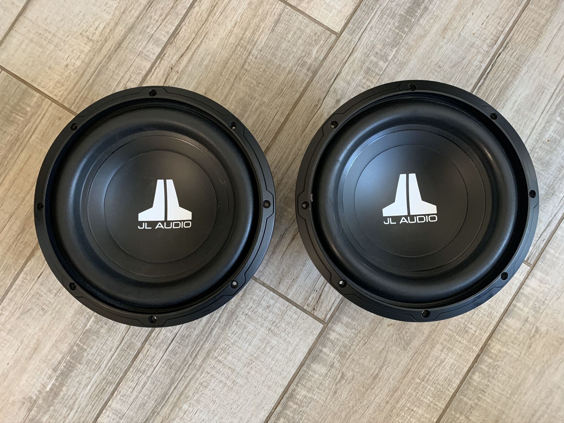 Two 10” JL Audio 10W0v3-4 subwoofers