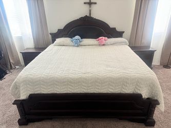Dark Wood Cal-King Bed Frame with Carved Headboard