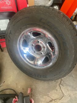 265/75/R16 tire with five lug pattern, full-size Dodge pick up, see pictures.  Located in big bear city.