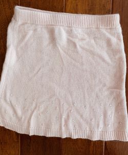 Super cute never worn Gymboree size 7 pale pink skirt with sequence on the bottom.