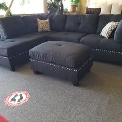 Brand new 104" x 75" reversible black linen sectional + ottoman