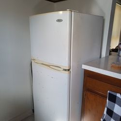  Refrigerator Smaller Size By Whirlpool Height 60" (5 Feet)  Width 24" ( 2 Feet)  By  Depth 22" . Works Good. Located In Westminster 