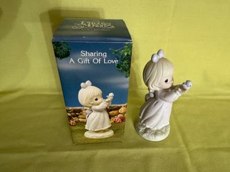 Precious moments, Sharing a gift of love figurine