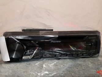 New Pioneer car radio. Remote included.