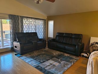 Power Reclining couch and love seat