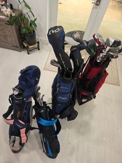Family of 4 sets of golf clubs like new! Tommy Armour Evo II