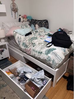 Free Twin Bed and Matress and 2 tables and bedside tables and a rug