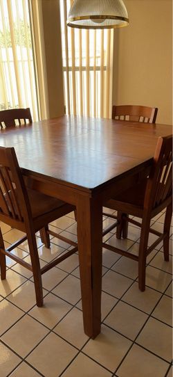 Hardwood Counter height Table with center leaf with 8 chair 54x54 opened and 54 x 36 closed