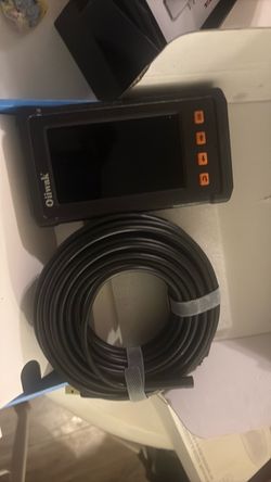 Camera  with 50 ft feed cord with hand held monitor
