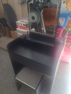 Black vanity table and stool