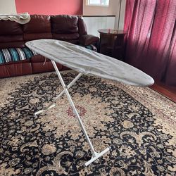 Adjustable ironing board