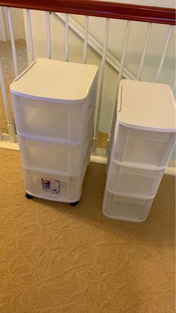 Two sterilite 3 drawer storage containers