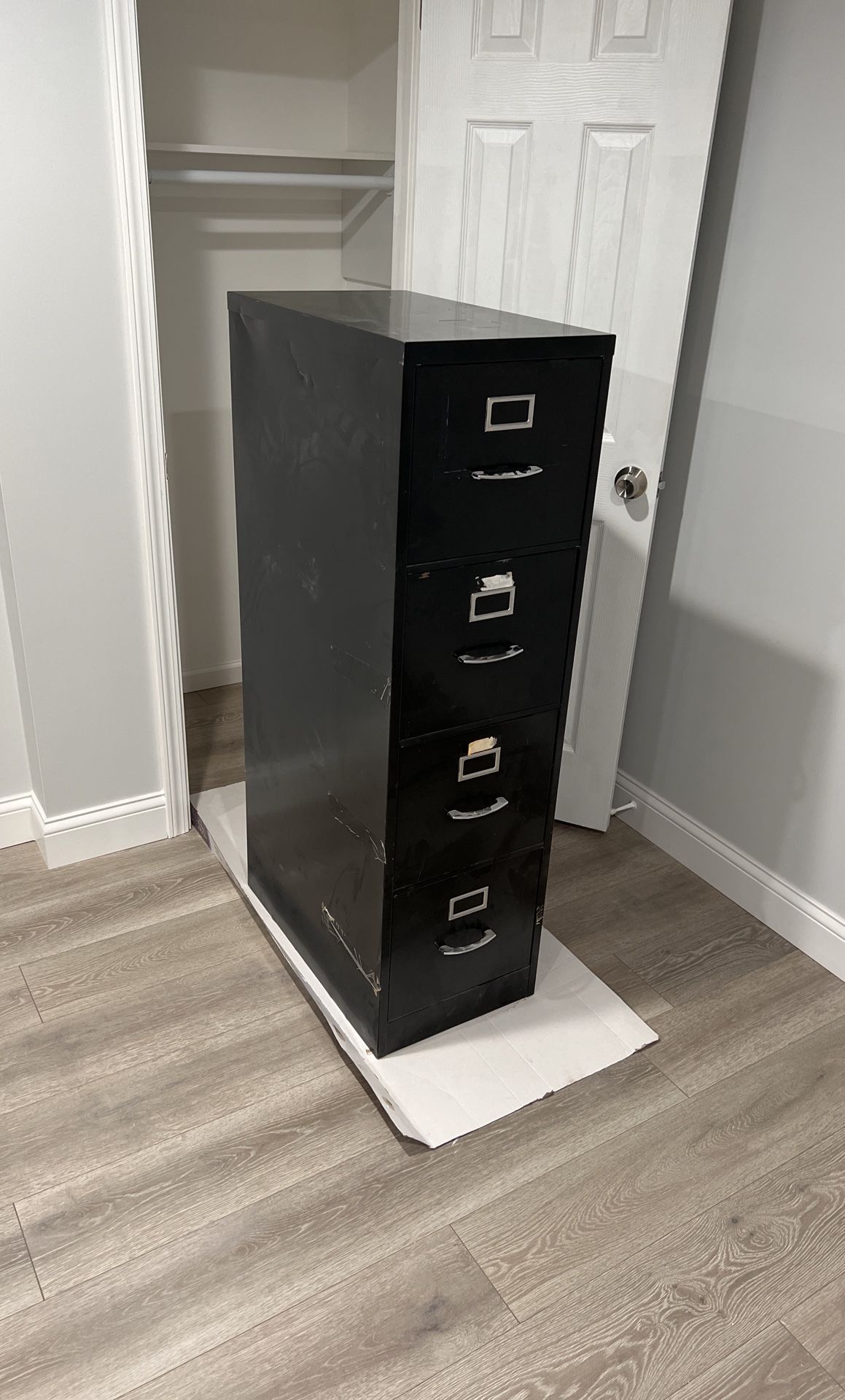 Four-drawer metal filing cabinet