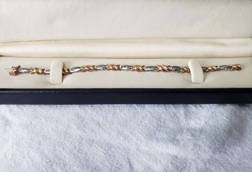 10k solid gold tennis bracelet,look at all pics for description.Willing to trade for a nice pendant