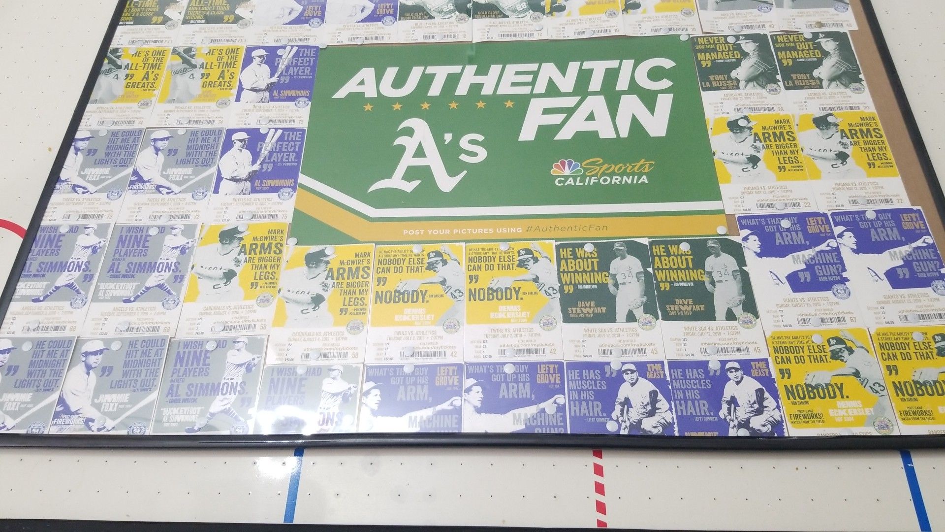 Tickets from last year's Oakland athletics game with frame
