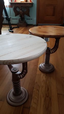 Two custom made coffee tables, cast iron base