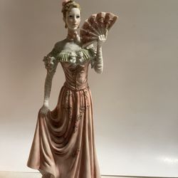 Porcelain figurine of woman 