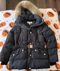 Authentic Michael Kors, black jacket with fur on hood very heavy duty size small women