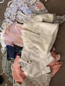 A lot of new clothes , size 3-6months or 6 months