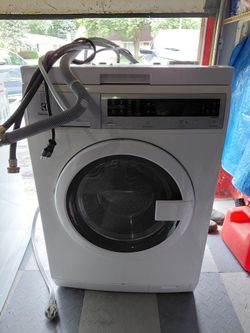 Electrolux compact electrical Washer with mounting kit and retractable shelf 300 series