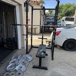 Bench press/squat rack with 7ft bar plus 235lbs of Olympic weights