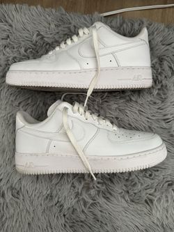 Classic all-white Nike Air Force 1 Lows, men's size 9.5