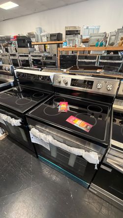 New-Open box stove with factory warranty!