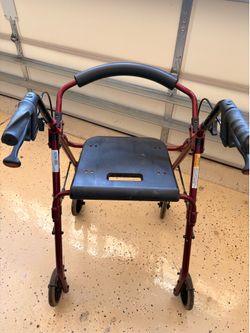 Rollator walker with four wheels
