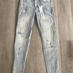 Purple jeans with paint