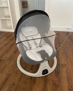 Electric rocking swing