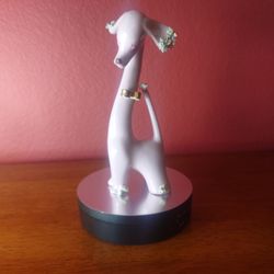 vintage porcelain figurine of a pink long-neck spaghetti dog made by Thames in the 1950s.