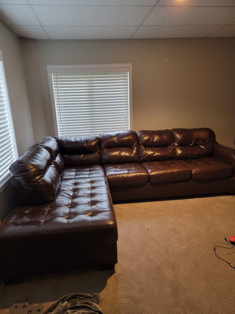 Leather Sectional With Ottoman