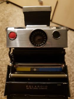 Vintage Leather Polaroid SX-70 Land Camera with original carrying case and Polaroid Brand Film Included.  Seems To Work!