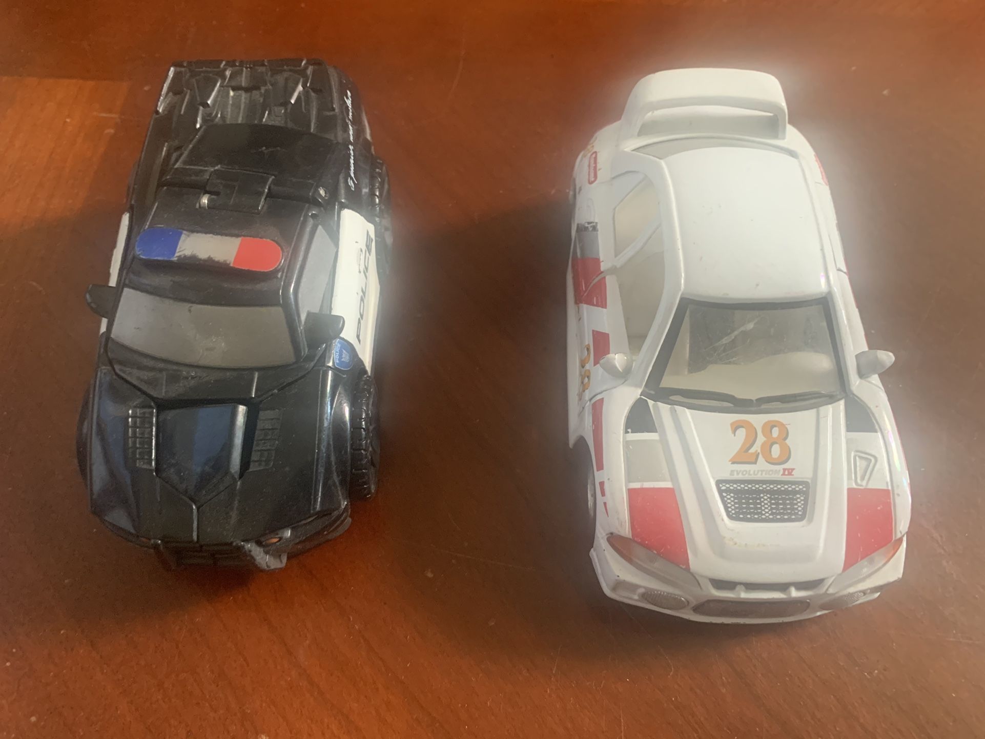 🚘👮🏻‍♂️ Kintoy Metal Race Car and Police Transformer Car in like new condition.  Scale is approximately 1:50  See eBay for price comparison on Race 