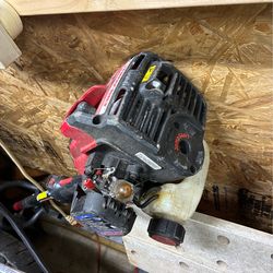 Troy built weedeater and attachment capable