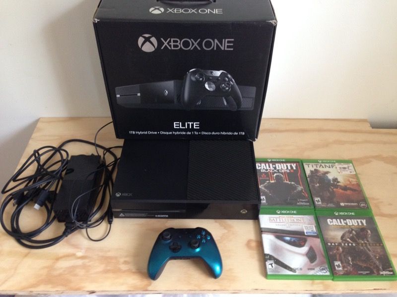 Black Xbox One Elite 1TB with shadow wave wireless controller +4 games