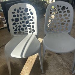4 Plastic. Chairs