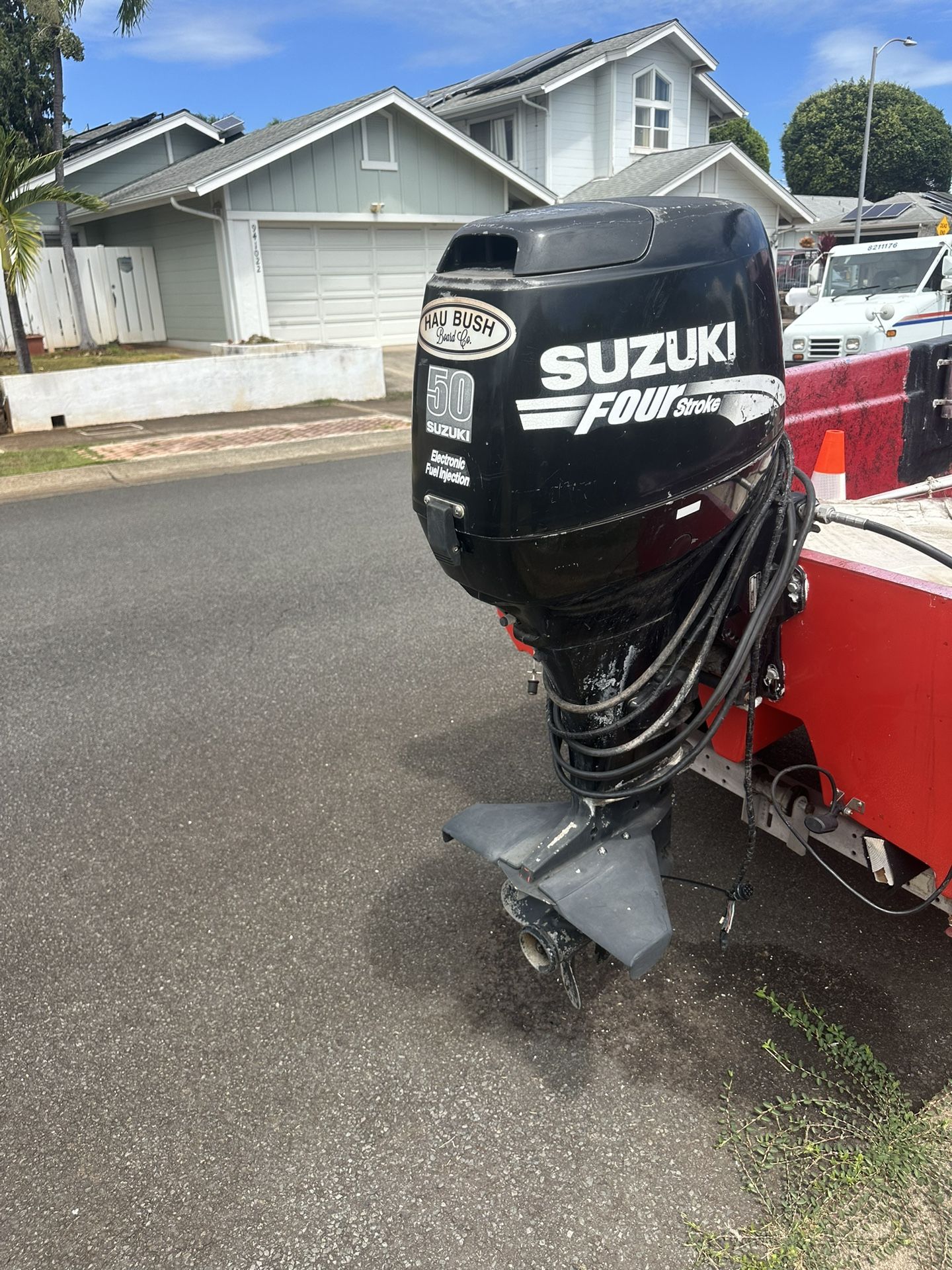 Suzuki 50 And A Suzuki 70 Outboards